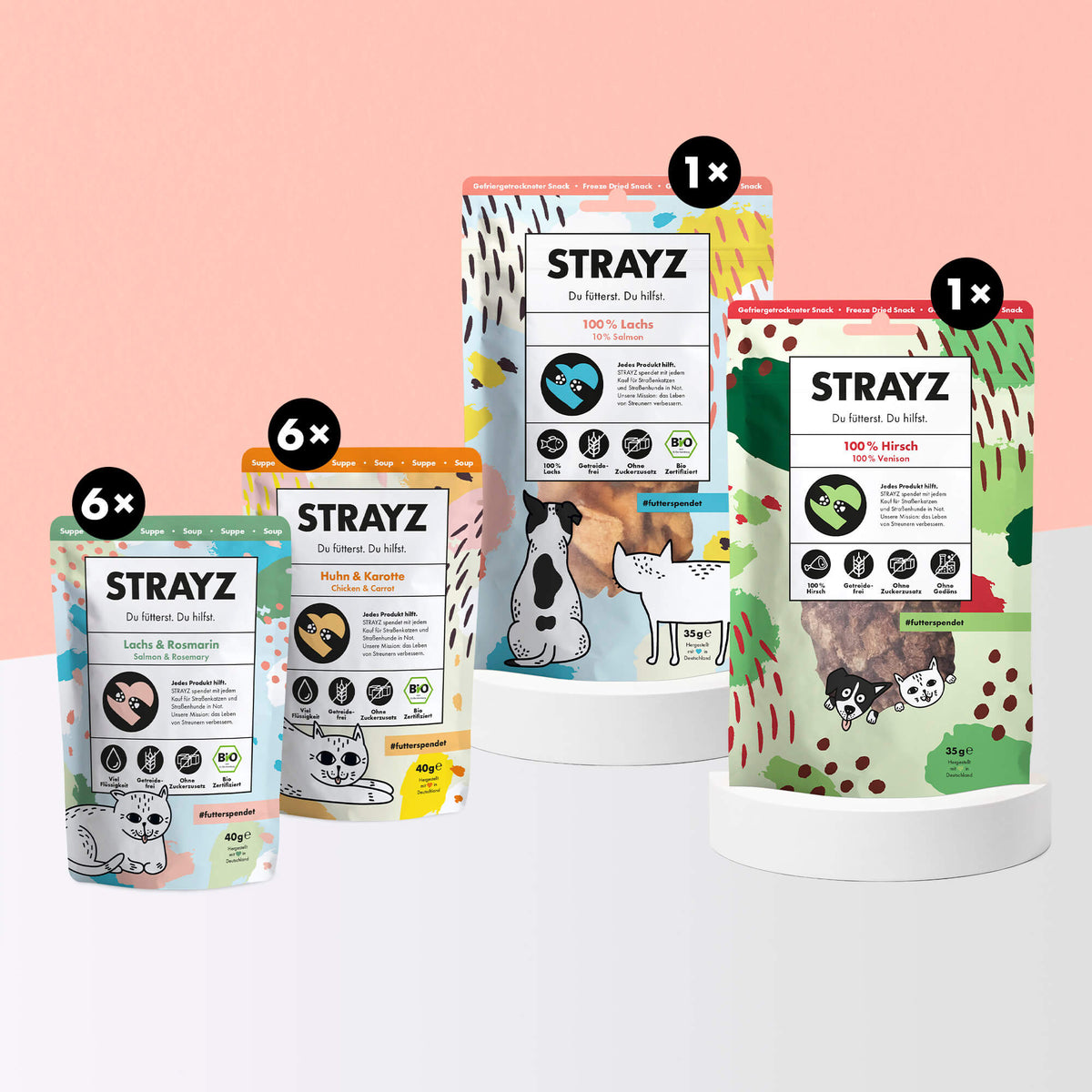 Bio-Katzensnack Probierpaket von STRAYZ. Natürliche Katzensuppen je 6x Huhn & Karotte sowie Lachs & Rosmarin. Zudem ist eine Packung gefriergetrockneter Bio-Lachs sowie Hirsch enthalten. Alle Snacks von STRAYZ sind ohne Zucker, Getreide und Konservierungsmittel.
