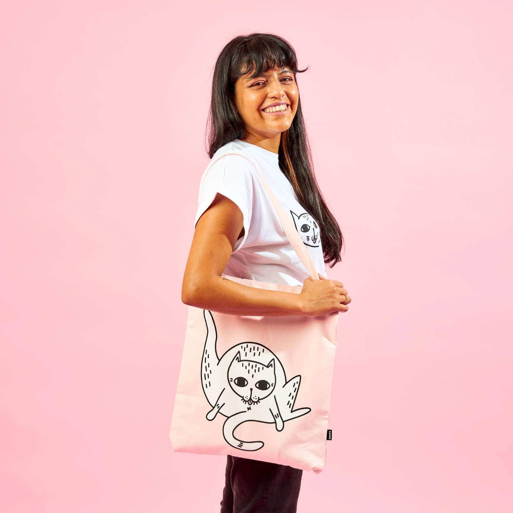 STRAYZ rosa Stofftasche mit Poleckmiez von der Seite.