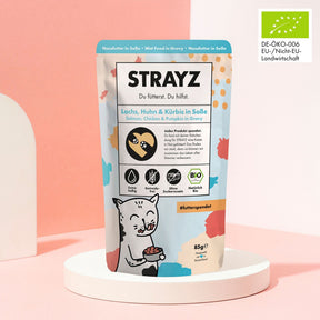 Bio Nassfutter in Soße in der Sorte Lachs, Huhn & Kürbis im 85g Beutel für Katzen. 