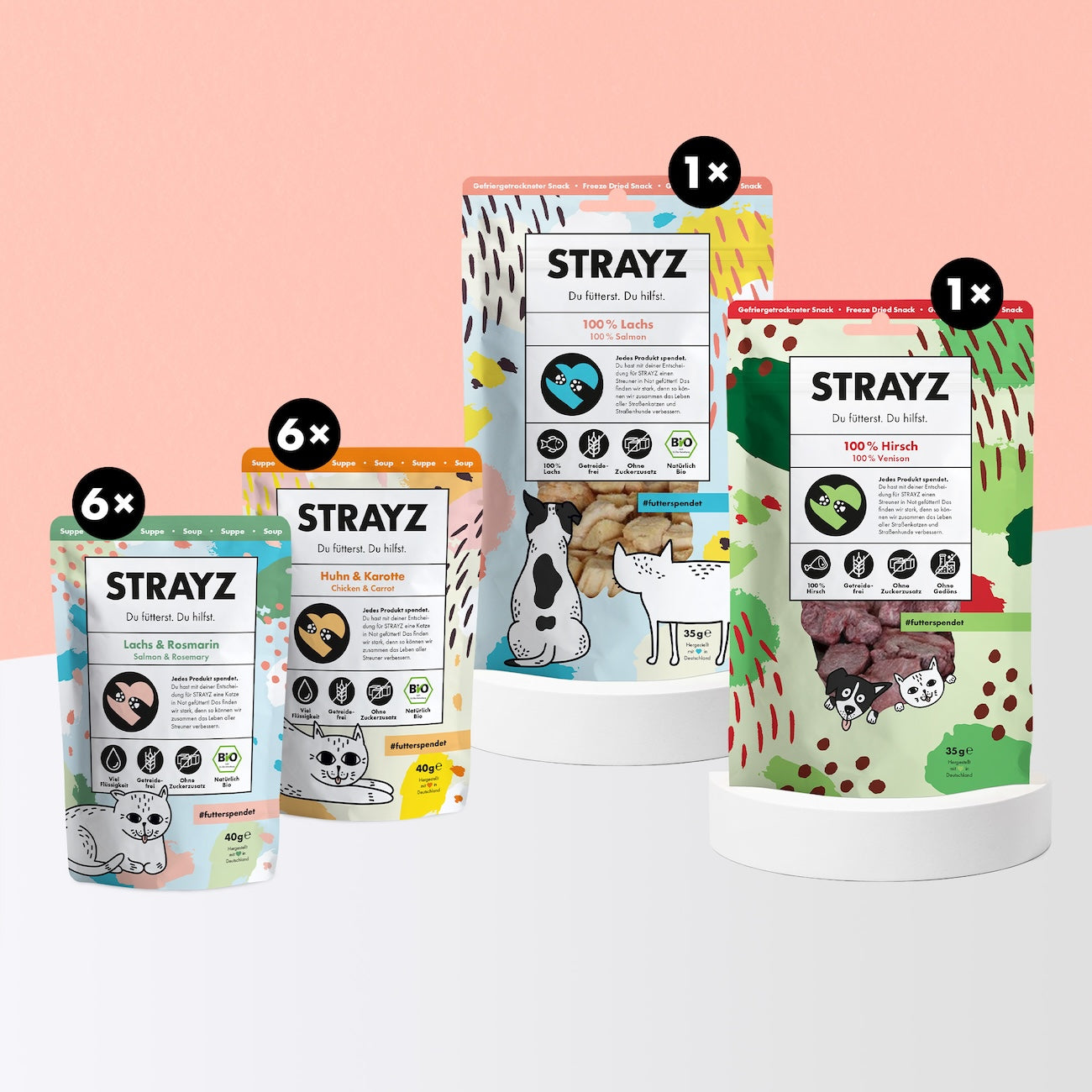 Bio-Katzensnack Probierpaket von STRAYZ. Natürliche Katzensuppen je 6x Huhn & Karotte sowie Lachs & Rosmarin. Zudem ist eine Packung gefriergetrockneter Bio-Lachs sowie Hirsch enthalten. Alle Snacks von STRAYZ sind ohne Zucker, Getreide und Konservierungsmittel. 