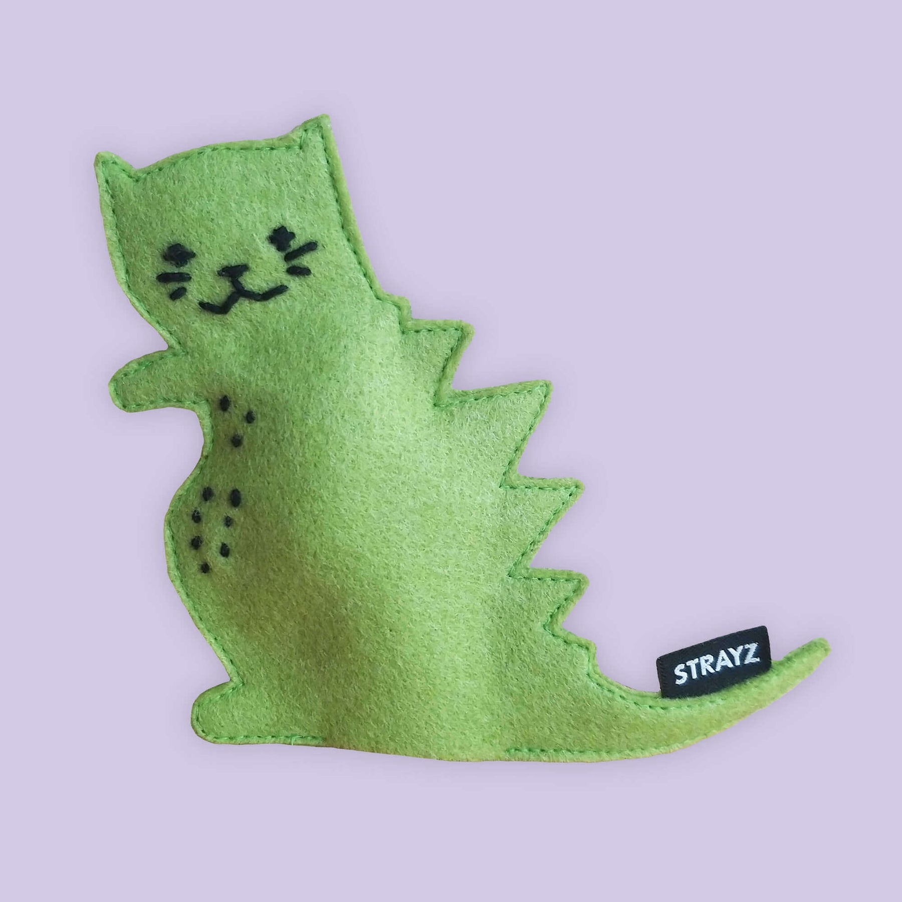 Katzenspielzeug Catzilla von STRAYZ: Wiederbefüllbares Baldriankissen aus veganen Materialien.